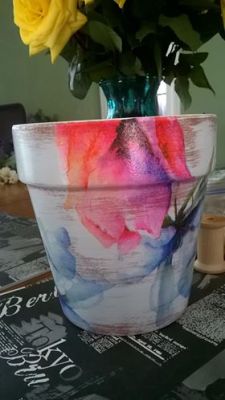 The beautiful handpainted flower pot I bought for my mother in