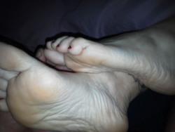 Footjob time.  Her feet make me rock hard