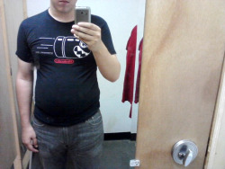 fatboydiet:  bigandstuffed:  Thought I’d grab a t shirt that looked tight to try on at the Salvation Army today. I’ve come to the conclusions that tight shirts feel fantastic on my belly.   I want that shirt, and that cute guy.