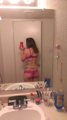 Sugars shares her ink, in this reverse mirror selfie