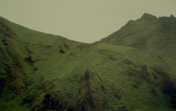 watermartini: Rolling lush green hills in Iceland.