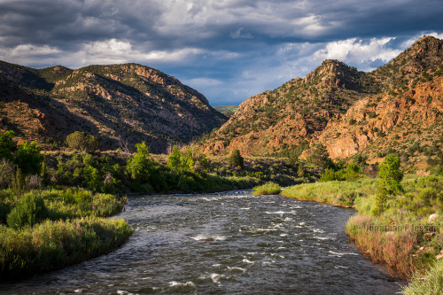 oneshotolive:  Storms pass a river valley in the Rocky Mountains,