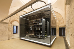 sixpenceee:  Rare books in a controlled environment cabin at