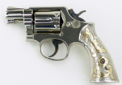 fmj556x45:  Smith & Wesson 10-70.38 Special caliber revolver.