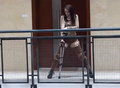 Sexy brunette girl wearing KAFOs Braces (Knee Ankle Foot Orthosis) and diaper pants with Incontinence PCV Slipfrom http://www.bracedlife.comtags: girls with crutches, medical bondage, pretender, abdl, recreational braces, double leg braces