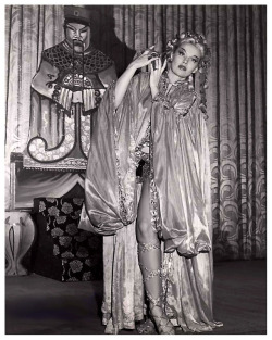 Lili St. Cyr        (aka. Marie Van Schaack)“In one of her early shows, she used a gold  Buddha placed on an altar inside a Chinese pavilion. To soft  Asian-inspired music, her movements told the story of a young bride  whose husband imprisoned