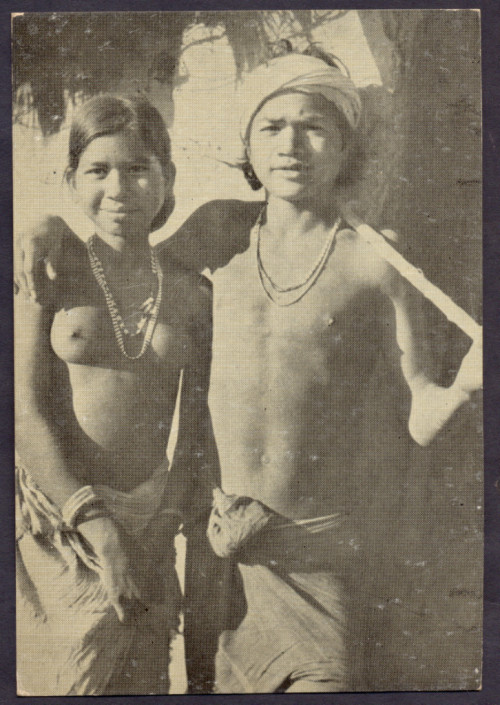   Indian woman and man, via Old Indian Photographs.   