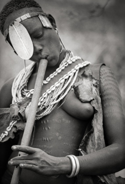 pachatata:  Hamar flute player, Turmi, Ethiopia. 1968. Clark