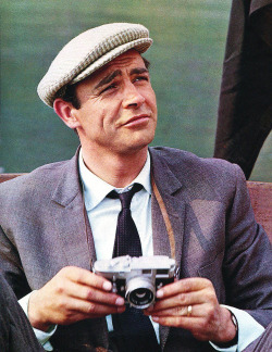 cinemamonamour:  Sean Connery holding a camera, early 1960s 