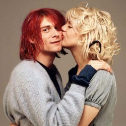 vintageeveryday:Kurt Cobain and Courtney Love photographed by
