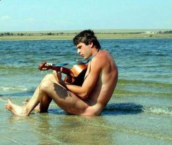 maleinstructor:  Naked guitarist 