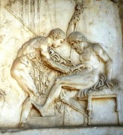 A marble relief from Herculaneum. Achilles scrapes rust from