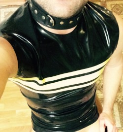 John was already getting into the rubber that Randy had been sharing with him. He wasn’t ready to go to Folsom or even MIR yet, but he was loving the latex. All resistance vanished, however, when Randy convinced John to put on the collar. All hesitation