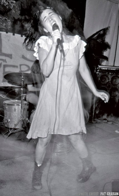riotgirlstylenow:   Kathleen Hanna on-stage looks from the 90s