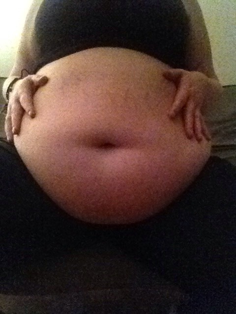 shinryuken3091: stuffedbellygirl18:  The most I can do without leaving the couch, my biggest shirts barely fit anymore!!  Gorgeous 