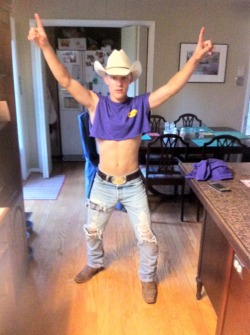 arcountryboy:  Nothin says school spirit like a belly shirt and
