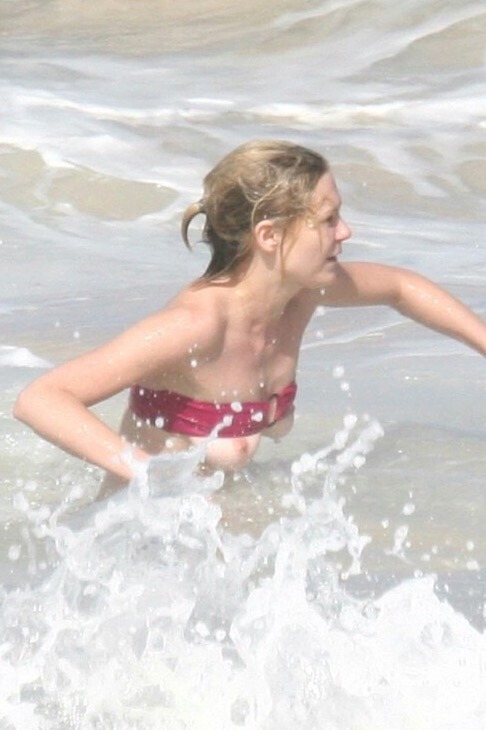 Kirsten Dunst falls out of her bikini top in St. Bartâ€™s, Caribbean (January 2005)