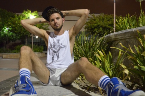 shorts-and-underwear:Shiny white shorts and blue sneakers