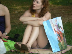 carelessinpublic:  In a park in a short skirt and showing her