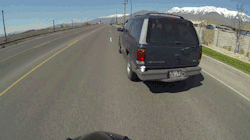 cracked:  Motorcyclist Notices Coffee Cup on Back of Moving SUV,
