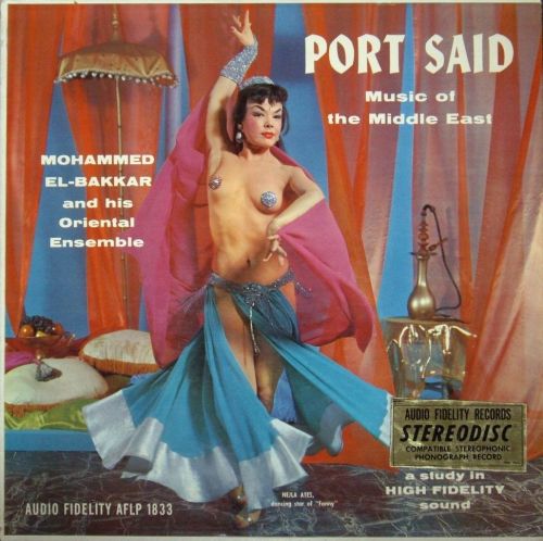 la-dulzura:  Nejla Ates appears on the cover of a 50’s-era album cover.. 