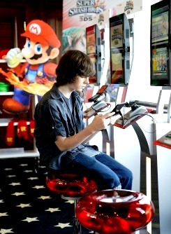 Norman Reedus and Chandler Riggs the Nintendo Lounge at SDCC