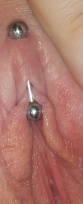 o-1968:  After piercing O’s labia, Anne Marie had given O a