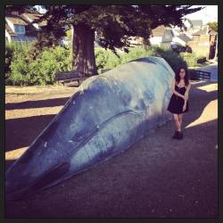 I have no idea how to pose next to a statue of a beached whale 