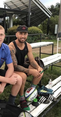 thongfaggot: NRL player Quade Cooper with a fan after training…