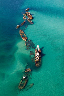 Here there be dragons (rusted hulks of shipwrecks at the edge