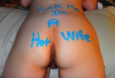 hotwifelover1970Â submitted:  My slutty Hotwife. Re-blog if you like her:)  thanks! “Fuck Me. I’m A Hot Wife.”