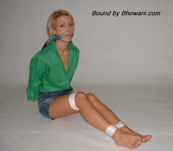 graybandanna:  Sabrina tied up in a green blouse with both a