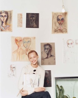 supermodelgif:  Sasha Pivovarova photographed with her artwork