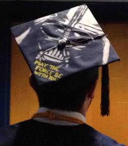 scificity:  saw this at graduation. I think he has the right