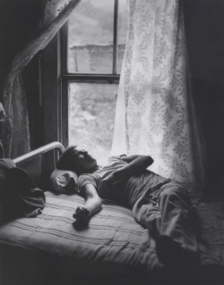 boyclouds:  A young man lays beside a window, 1968, by Arthur