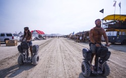 #tbt to topless racing Segways with @MSharp3D on the playa