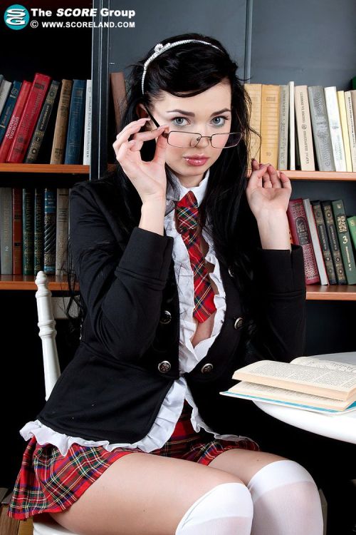 Schoolgirl Sha Rizel enjoying some milk and cookies during her study break