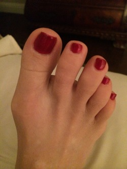 So, I met a local follower of my tumblr blog and let him paint my toes.Â I think he did a pretty good job, although his hands were pretty shaky while he was doing it.Â  It was pretty kinky.Â  Also, on a related note, you may notice that I am doing a prett