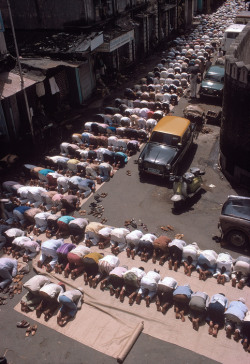 umarrr:  Muslims praying in front of the Raudat Tahera Mosque,