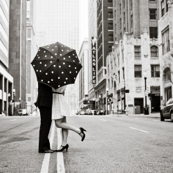 black-and-white:  umbrella kiss (by crystal.franks) 