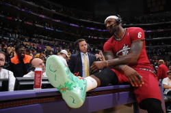 nba:  LeBron James #6 of the Miami Heat participates in a post