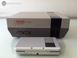 isquirtmilkfrommyeye:  Here’s a retro NES skin for your New