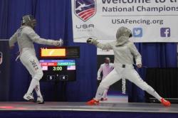 modernfencing:  [ID: a sabre fencer hitting her opponent’s