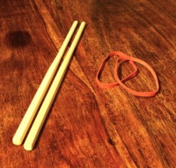 dare-master:  Chopstick Nipple Clamps Materials Required 2 pairs of chop sticks. Avoid wooden ones you snap apart to avoid splinters. 4 Elastic/rubber bands. Take one pair of chopsticks and hold them together. Wrap one elastic band around two of the ends,