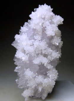 mineralists:  Light Lavender pink Amethyst partially covered