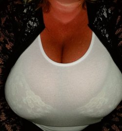 smushedbreasts:  Huge breasts stretching out a tight white shirt!
