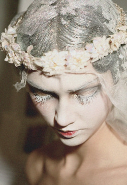 rosettes:  Ksenia Kahnovich backstage at John Galliano Fall/Winter