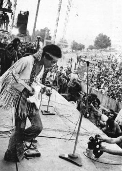 pinkfled:  Jimi Hendrix performing at Woodstock Festival - August