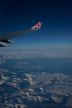Icebergs somewhere over Greenland on our way back to America.
