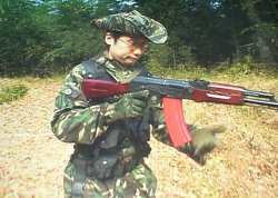metalgeartrivia:  Enjoy this photo of an armed and dangerous Hideo Kojima. In the meantime, I will go search for more trivia…